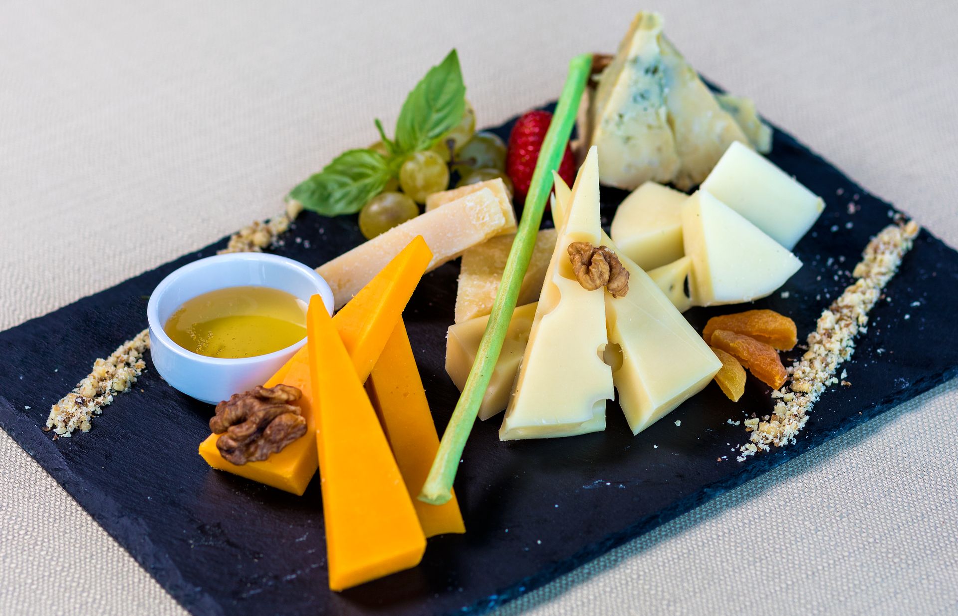 Close-up of assorted cheeses on a board